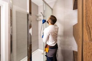 A worker doing bathroom renovations in Cairns