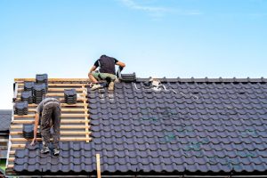 Roofers completing a roofing job in cairns